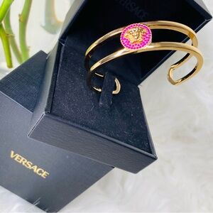 Versace Gold Bracelet with Medussa Surrounded by Pink Stones. Expandable